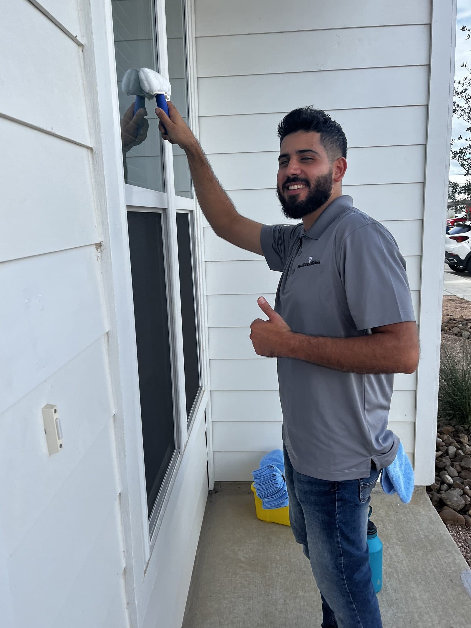 Exterior glass being cleaned at a real job site